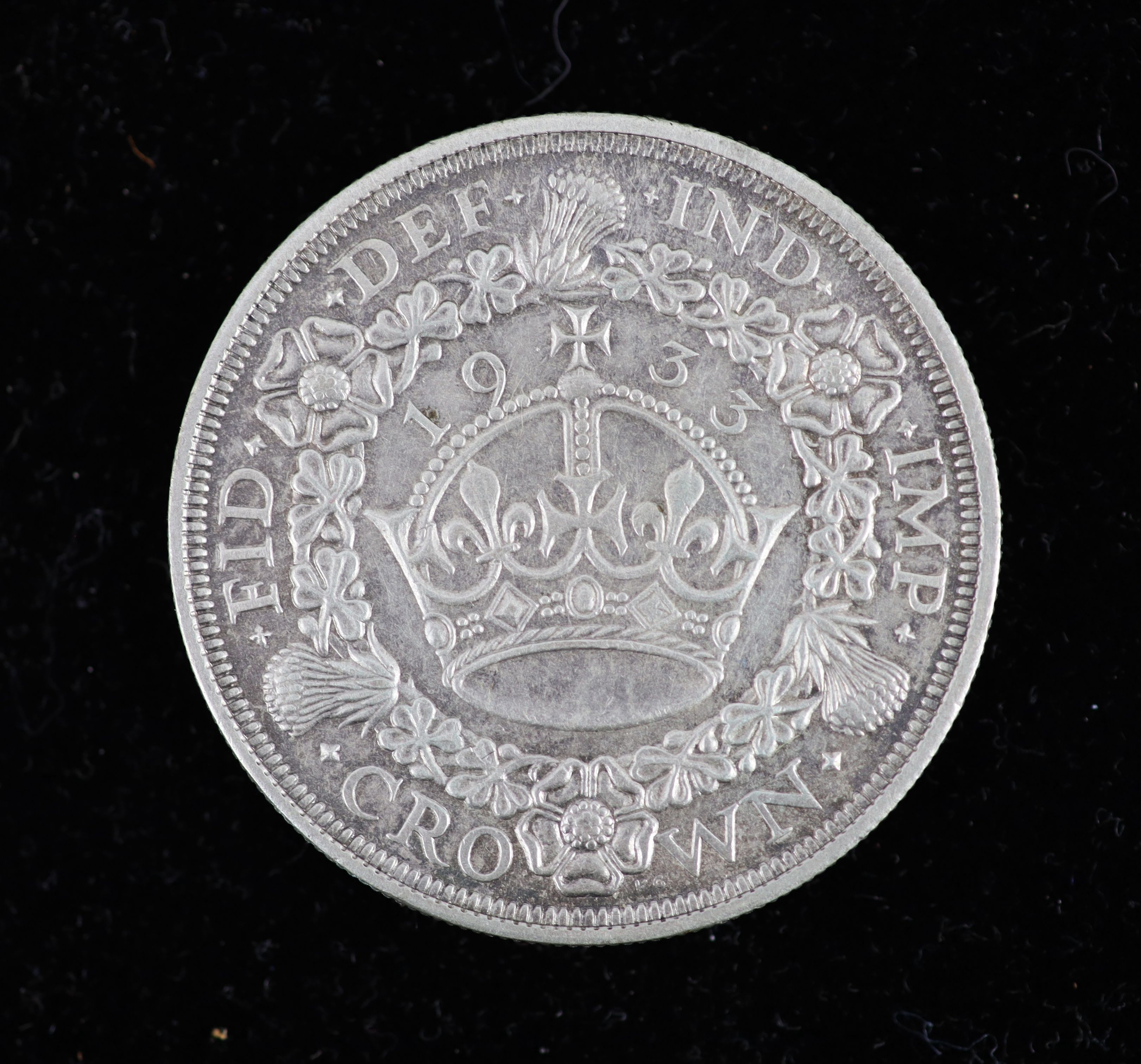 A George V specimen set of nine coins, 1933, fourth coinage, comprising Crown, (S4036), lightly toned, near EF, halfcrown, florin, sixpence and threepence, cleaned otherwise good EF/UNC, shilling, cleaned good VF/EF, pen